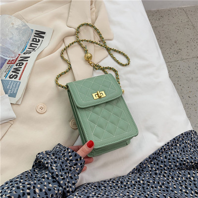 Γυναικεία τσάντα με μεταλλικό κούμπωμα και μακριά λαβή - οικολογικό δέρμα