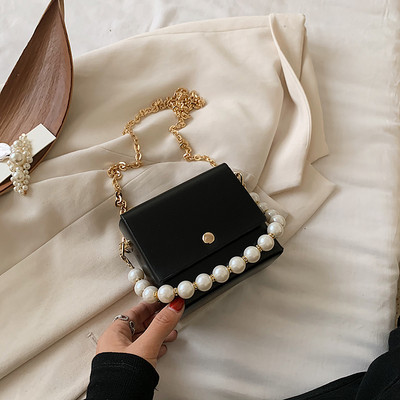 Κομψή γυναικεία τσάντα με μακρές και κοντές λαβές