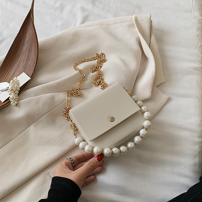 Κομψή γυναικεία τσάντα με μακρές και κοντές λαβές