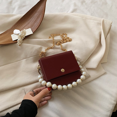 Κομψή γυναικεία τσάντα με μακρές και κοντές λαβές