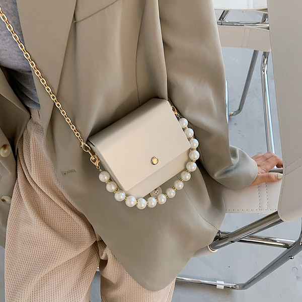 Κομψή γυναικεία τσάντα με μακρές και κοντές λαβές