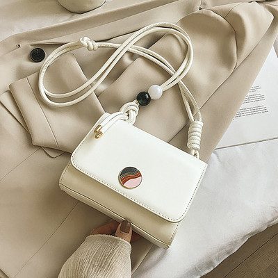 Γυναικεία τσάντα με μεταλλικό κούμπωμα και μακριά λαβή από οικολογικό δέρμα - διάφορα χρώματα