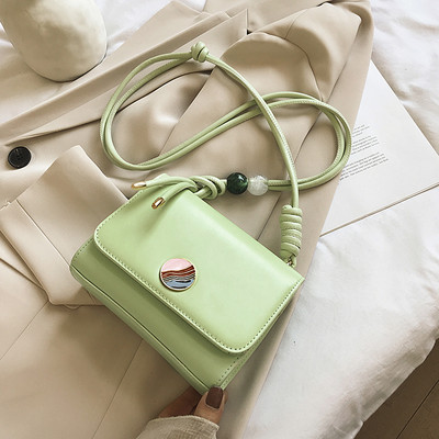 Γυναικεία τσάντα με μεταλλικό κούμπωμα και μακριά λαβή από οικολογικό δέρμα - διάφορα χρώματα