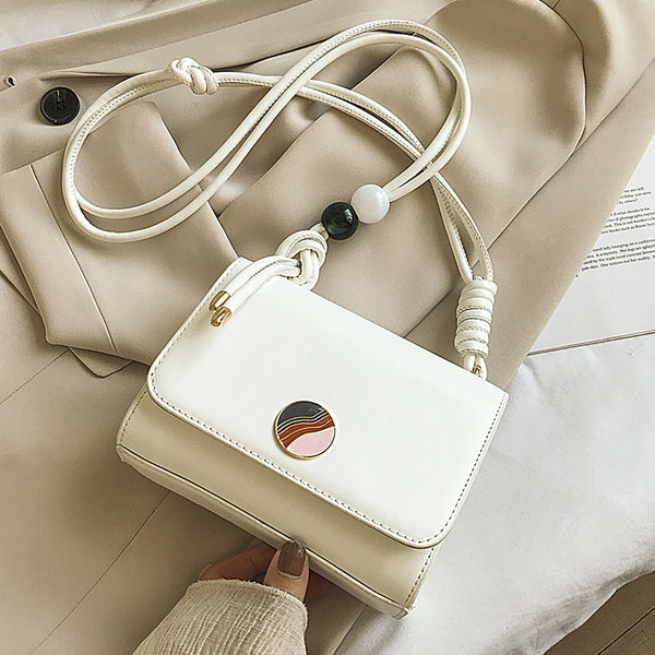 Γυναικεία τσάντα με μεταλλικό κούμπωμα και μακριά λαβή από οικολογικό δέρμα - διάφορα χρώματα