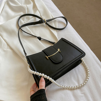 Γυναικεία εκο δερμάτινη τσάντα με πέρλες