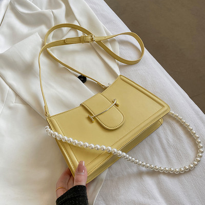 Γυναικεία εκο δερμάτινη τσάντα με πέρλες