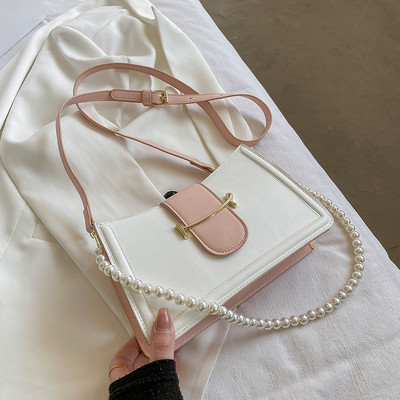 Γυναικεία εκο δερμάτινη τσάντα με πέρλες