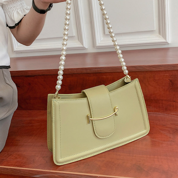 Γυναικεία εκο δερμάτινη τσάντα με πέρλες