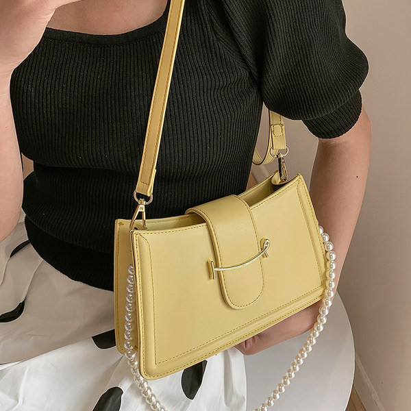 Γυναικεία εκο δερμάτινη τσάντα με πέρλες