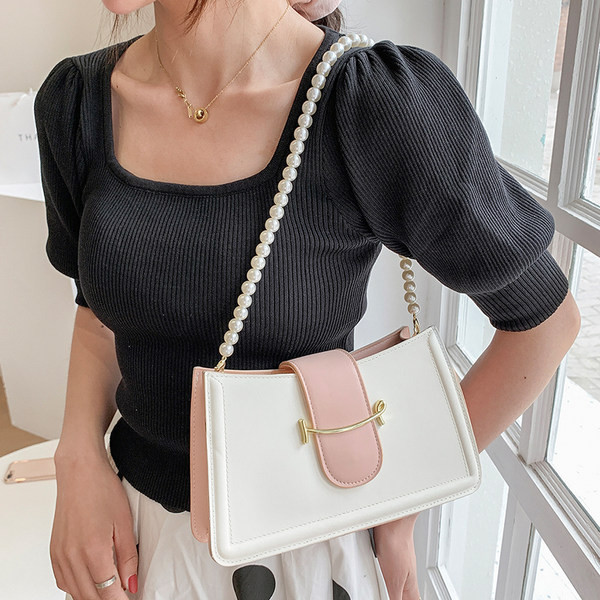 Γυναικεία εκο δερμάτινη τσάντα με πέρλες