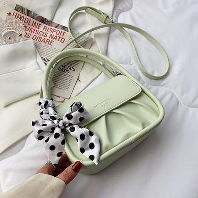 Μικρή καθημερινή τσάντα με κορδέλα και δύο λαβές