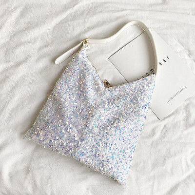 Γυναικεία καθημερινή τσάντα με πούλιες και ρυθμιζόμενη λαβή