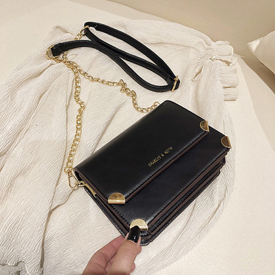 Γυναικεία έκο δερμάτινη τσάντα με μεταλλική λαβή