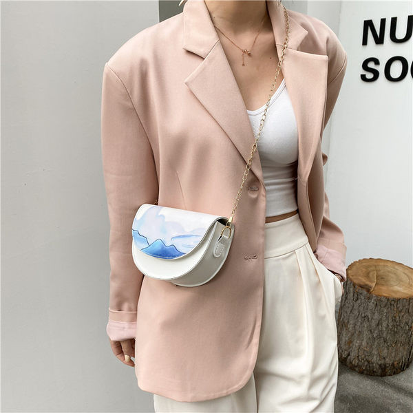 Γυναικεία έκο δερμάτινη τσάντα με μακριά μεταλλική αλυσίδα