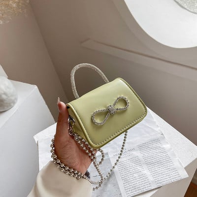 Μοντέρνα μικρή τσάντα διακοσμημένη με κορδέλα και πέτρες