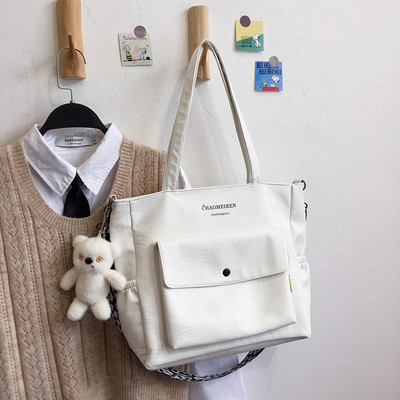 Γυναικεία τσάντα από οικολογικό δέρμα με επιγραφή