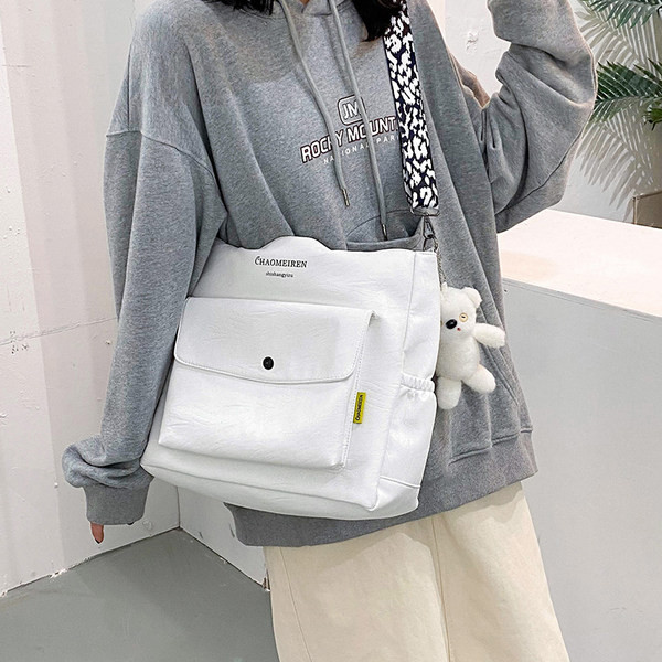 Γυναικεία τσάντα από οικολογικό δέρμα με επιγραφή