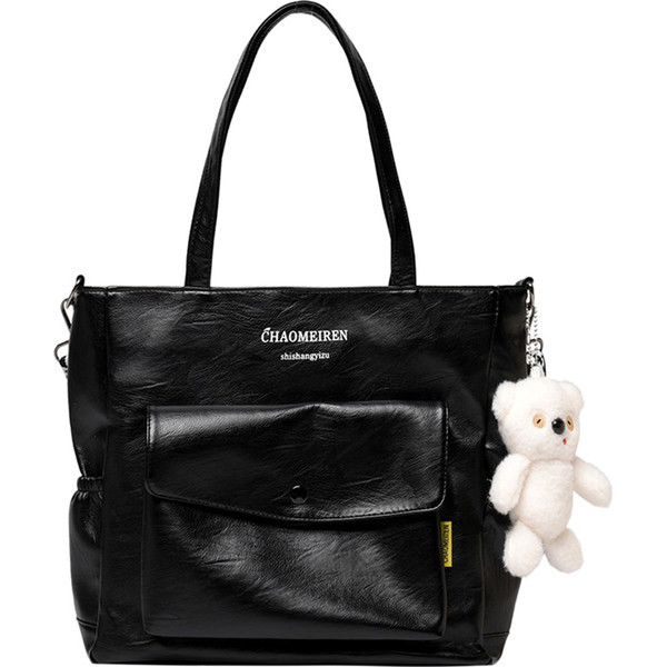 Γυναικεία τσάντα από οικολογικό δέρμα με επιγραφή