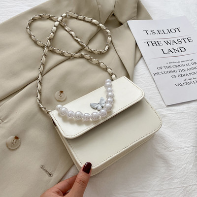 Γυναικεία καθημερινή τσάντα με πέρλες και μακριά λαβή