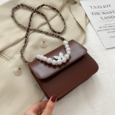 Γυναικεία καθημερινή τσάντα με πέρλες και μακριά λαβή