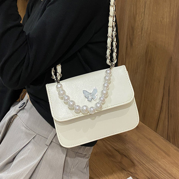 Γυναικεία καθημερινή τσάντα με πέρλες και μακριά λαβή