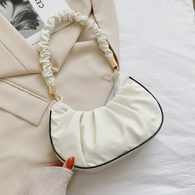 Moteriška odinė rankinė su trumpa rankena ant peties