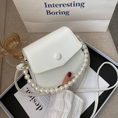 Jauna modeļa ādas rokassomiņa ar pērlēm