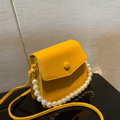 Jauna modeļa ādas rokassomiņa ar pērlēm