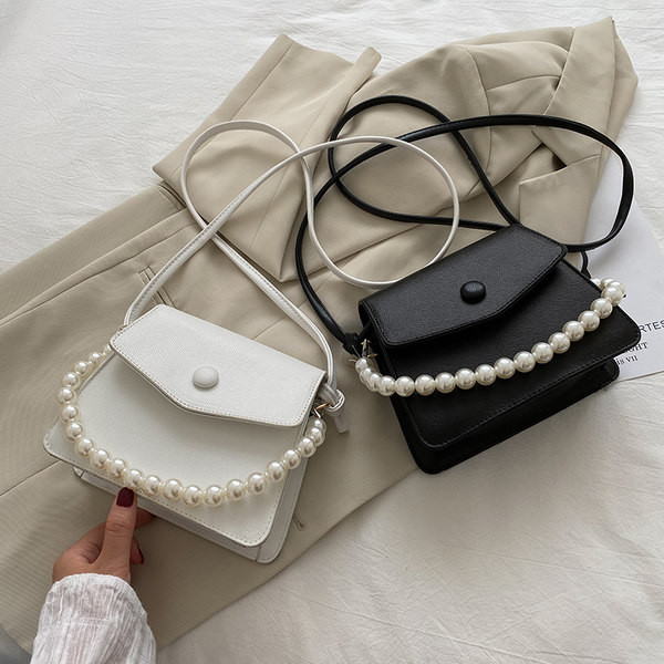 Jauna modeļa ādas rokassomiņa ar pērlēm