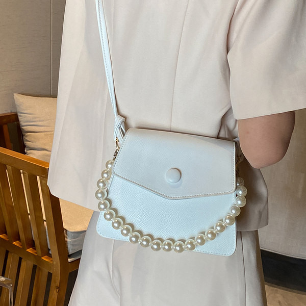 Jauna modeļa ādas rokassomiņa ar pērlēm