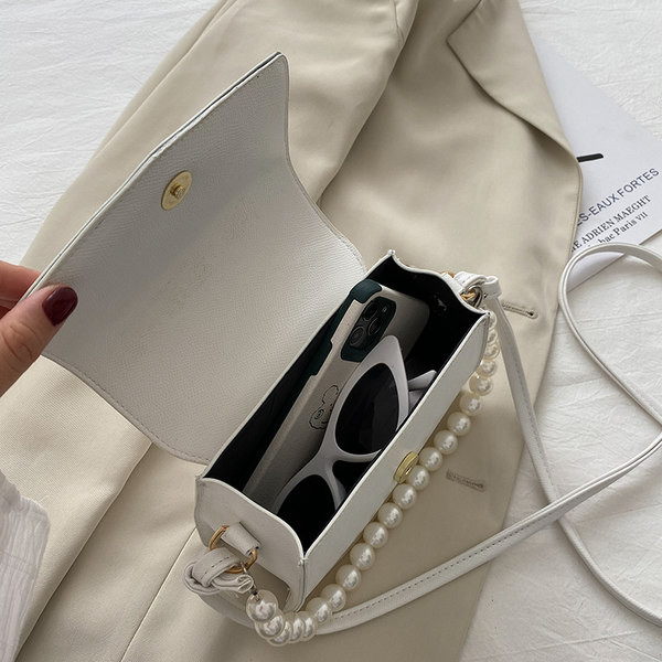 Jauna modeļa ādas rokassomiņa ar pērlēm