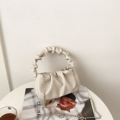 Σύγχρονη γυναικεία τσάντα από οικολογικό δέρμα με λαβή