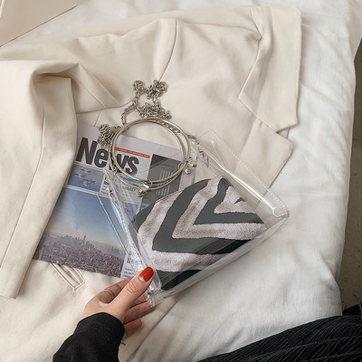 Sieviešu caurspīdīga soma ar metāla riņķi un garu rokturi