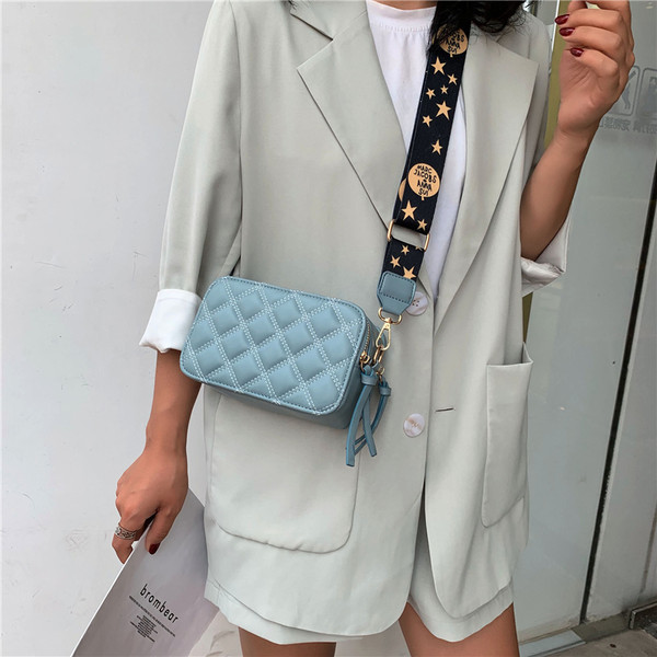 Geanta moderna din piele cu fermoare