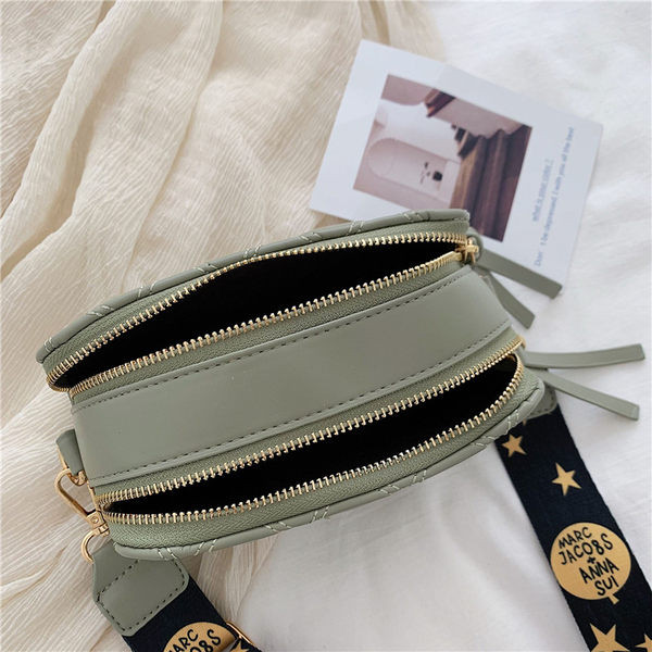 Geanta moderna din piele cu fermoare