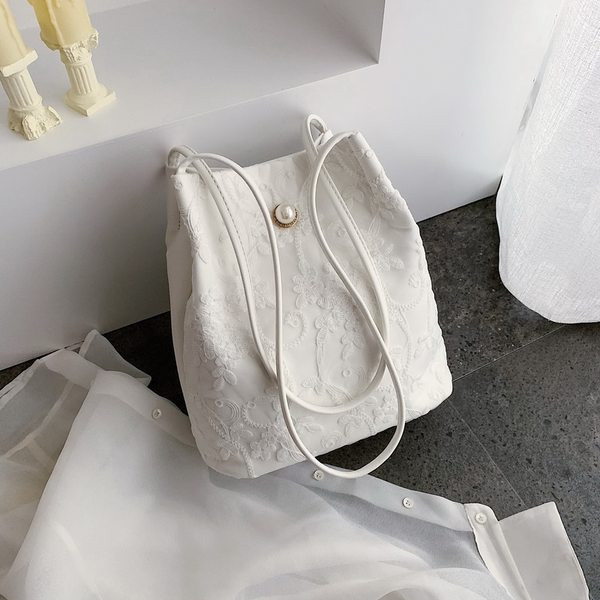 Ikdienas sieviešu soma ar izšuvumu - vairāki modeļi