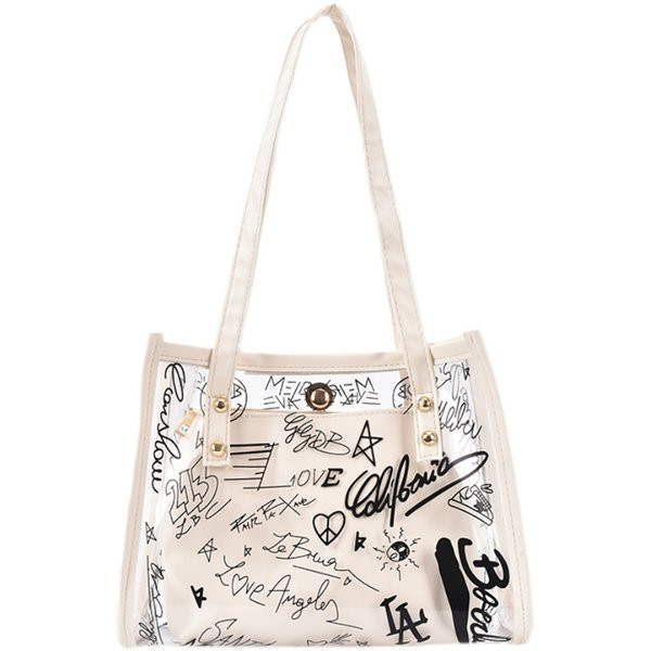 Γυναικεία διαφανής τσάντα με μεταλλικά στοιχεία