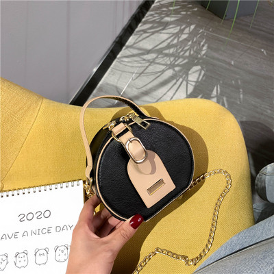 Sieviešu moderna apaļa soma ar rokturi un ķēdīti