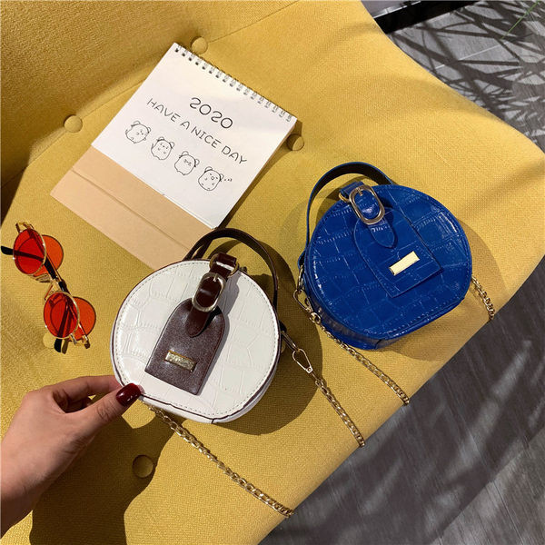 Sieviešu moderna apaļa soma ar rokturi un ķēdīti