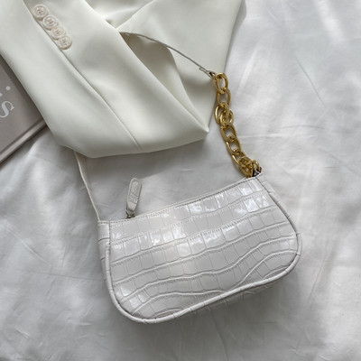 Γυναικεία έκο δερμάτινη τσάντα με μεταλλική αλυσίδα