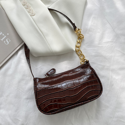 Γυναικεία έκο δερμάτινη τσάντα με μεταλλική αλυσίδα