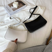 Sieviešu ādas soma ar īsu pērļu rokturi