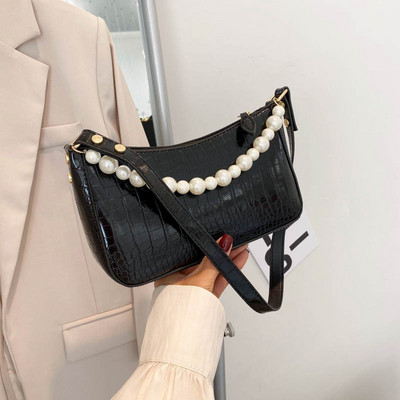 Sieviešu ādas soma ar īsu pērļu rokturi