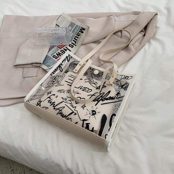 Geanta de dama din silicon cu aplicatie si inchizator metalic