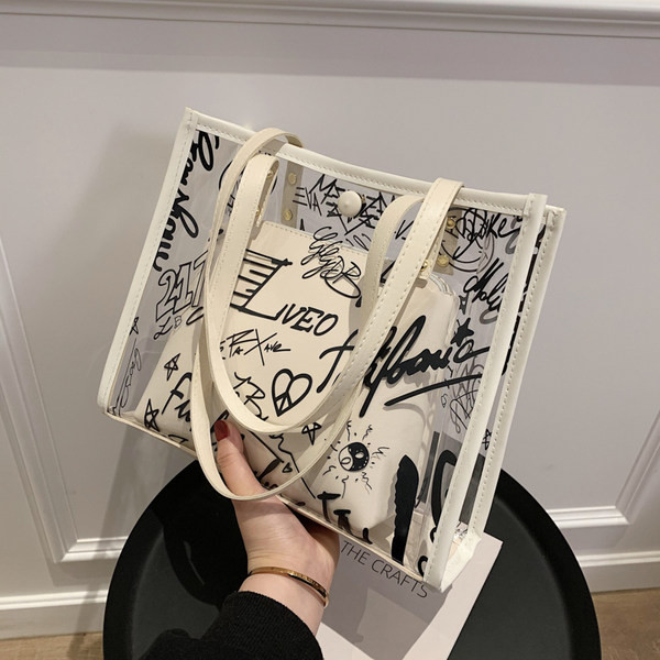 Geanta de dama din silicon cu aplicatie si inchizator metalic