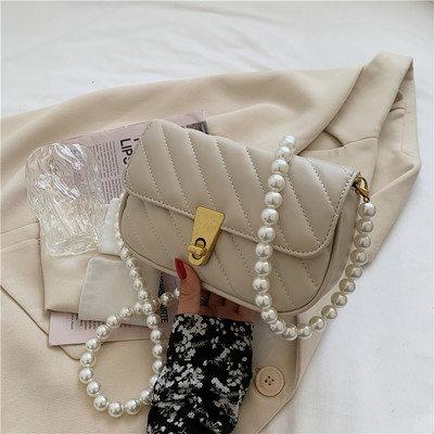 Moderna maza eko ādas soma ar pērļu rokturi