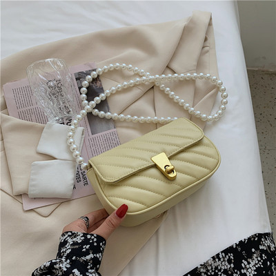 Moderna maza eko ādas soma ar pērļu rokturi