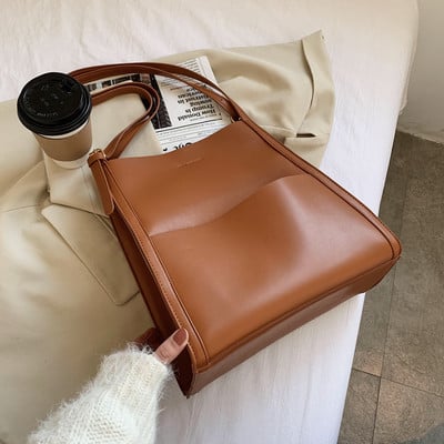 Γυναικεία τσάντα  με μακριά λαβή