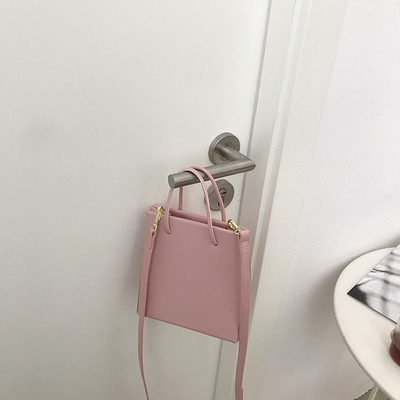 Γυναικεία τσάντα νέο μοντέλου από οικολογικό δέρμα με δύο λαβές σε διάφορα χρώματα