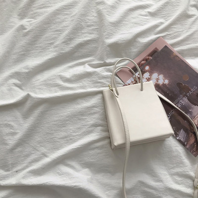 Γυναικεία τσάντα νέο μοντέλου από οικολογικό δέρμα με δύο λαβές σε διάφορα χρώματα